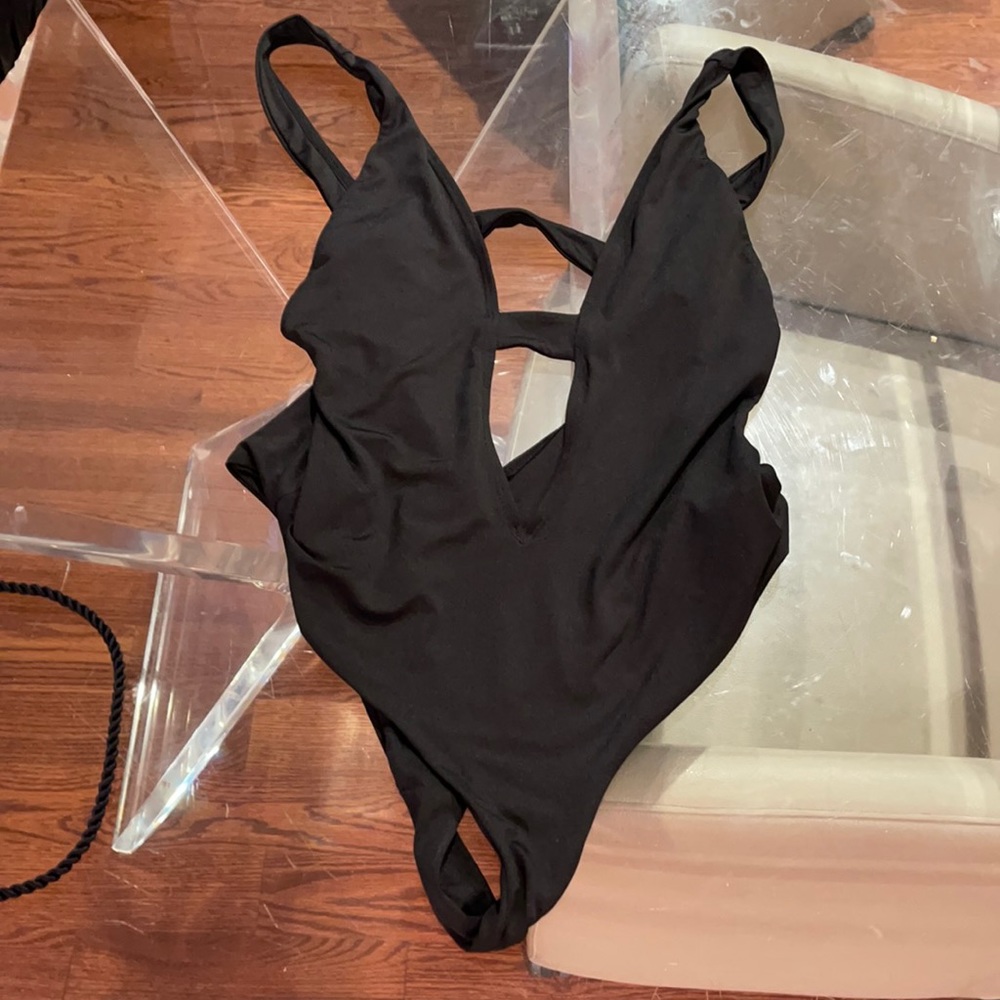 Black 1 piece medium cut out bathing suit